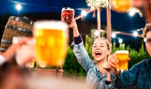 Woman raising a beer stein