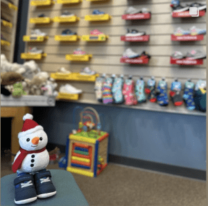 Snowman with kids shoes